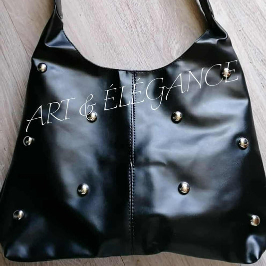 🖤 Sac à main noir avec détails en ferraille – L’allure qui se démarque 🖤