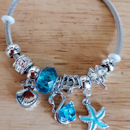 🌊 Jonc en acier inoxydable argent & bleu – Charms marins 🌊