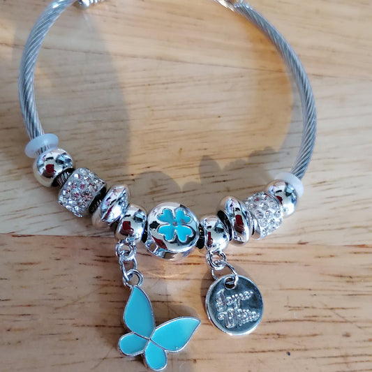 ✨ Jonc "Johanna" en acier inoxydable argenté avec charms et symboles porte-bonheur ✨